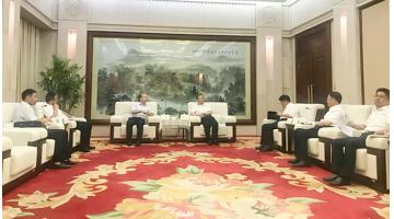 湖南长沙市委副书记、市长胡忠雄会见合乐HL8首创人王双飞博士